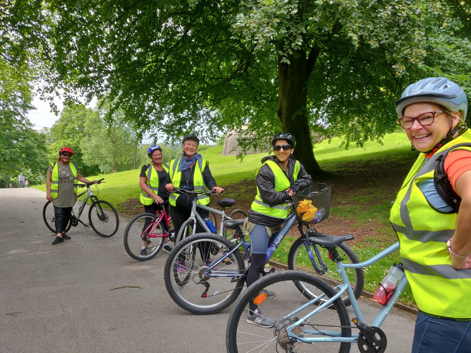 Ladies by bikes in park